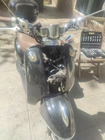 The open front of the scooter